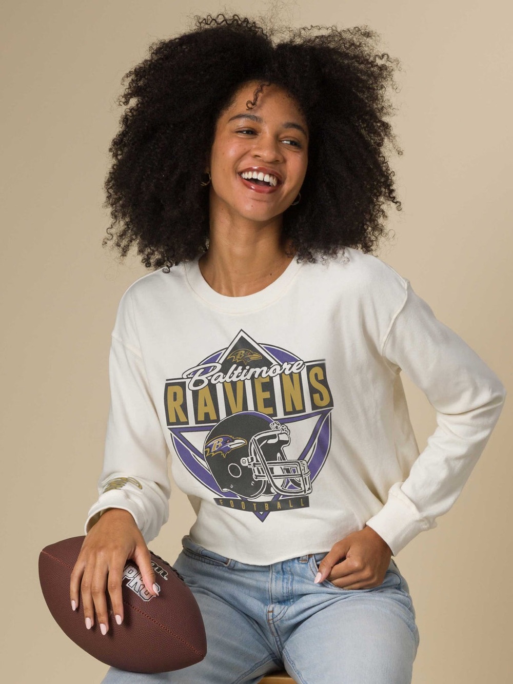 Junk Food Women’s Baltimore Ravens Helmet Crop Retro Fleece Vintage White LS tee